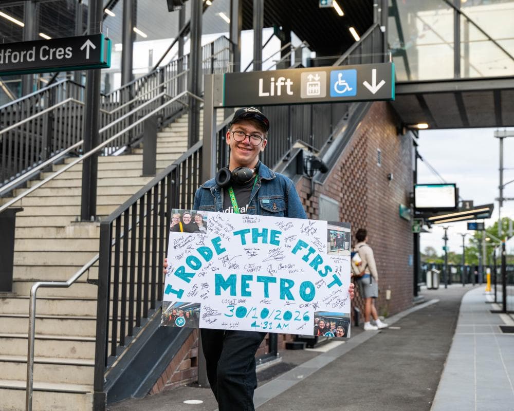 Metro-themed shirts, ‘We love public transport’ signs and a kiss at Bankstown: Sydney’s newest train line opens